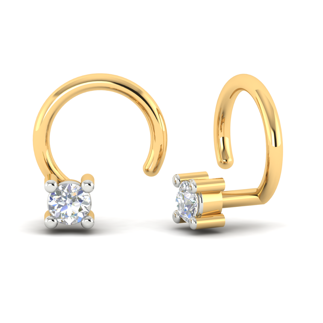 The Juliet Diamond Solitaire Nosepin by Niraa features a pair of gold nose rings adorned with diamond-like gemstones at the open ends, shown against a white background displaying both front and side views.