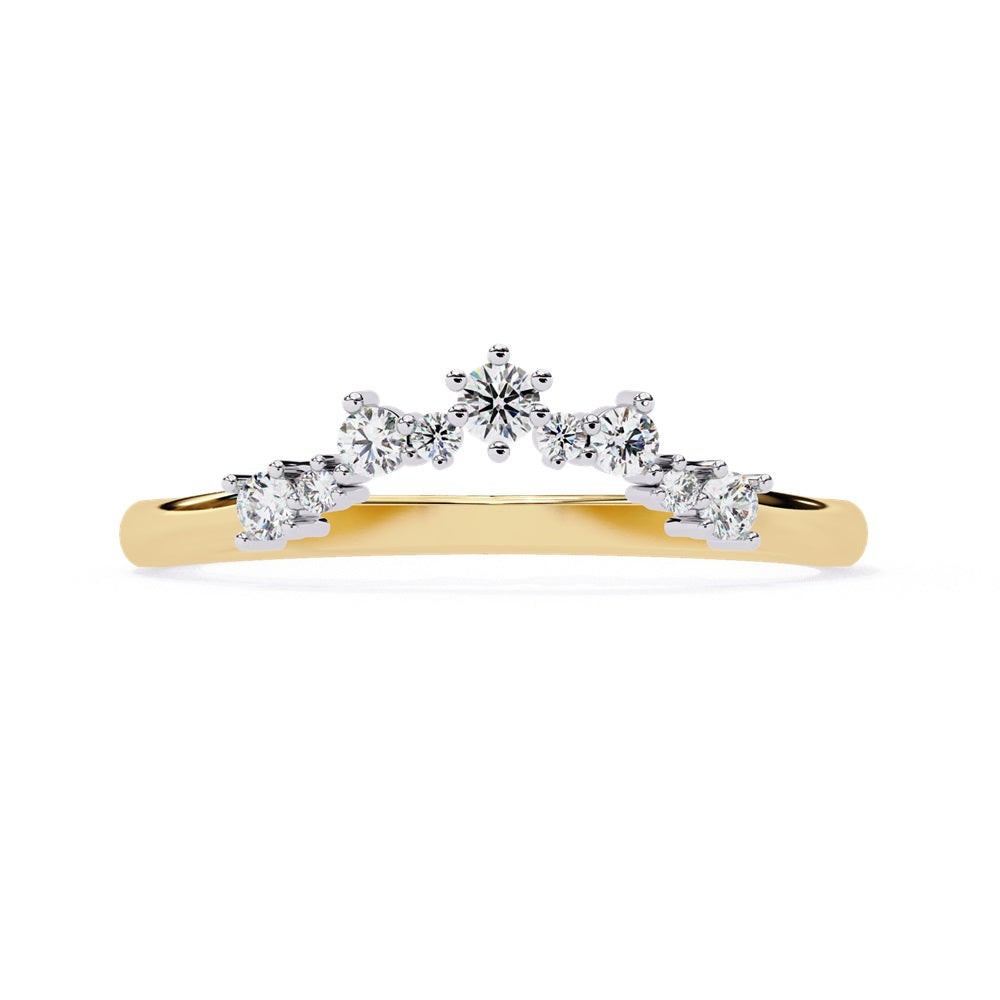 The Timeless Diamond Chevron Band by Niraa is a luxury accessory featuring a gold band with a row of seven small, sparkling diamonds in a crescent shape. The larger central stone creates a tiara-like design, epitomizing elegance when photographed against a white background.
