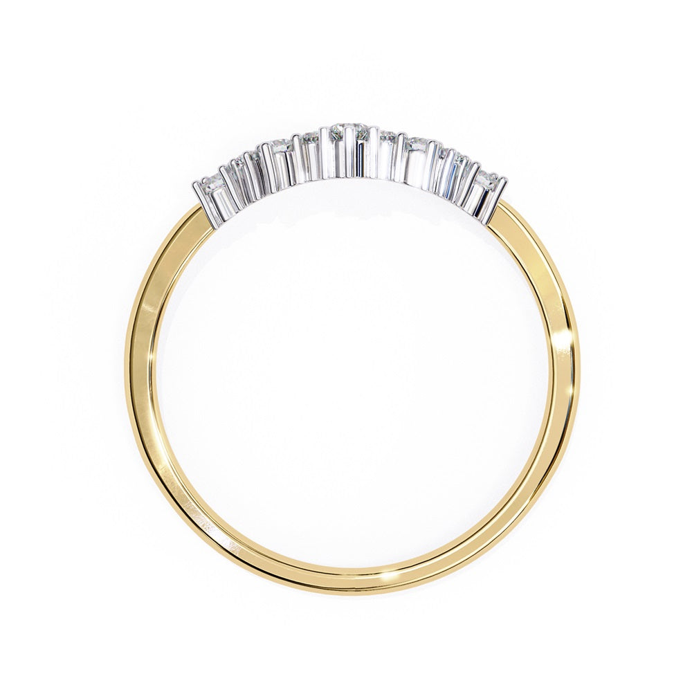 The Timeless Diamond Chevron Band by Niraa is a luxury accessory featuring a gold band with a row of seven small, sparkling diamonds in a crescent shape. The larger central stone creates a tiara-like design, epitomizing elegance when photographed against a white background.
