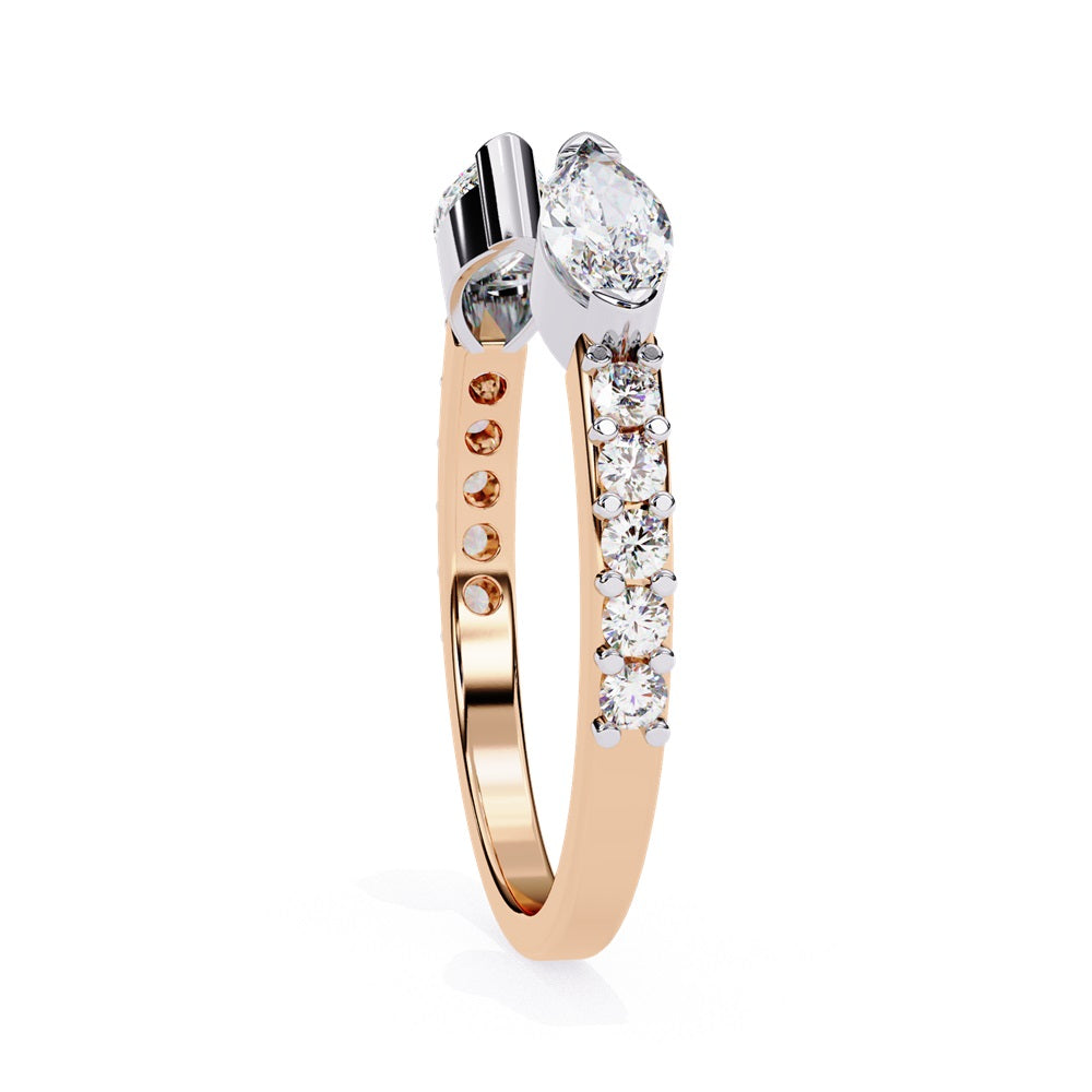 The Niraa Marquise Diamond Open Band is a luxury accessory with gold and silver featuring large marquise-cut diamonds at each end. Smaller rectangular diamonds sparkle on the sides, set against a plain white background.