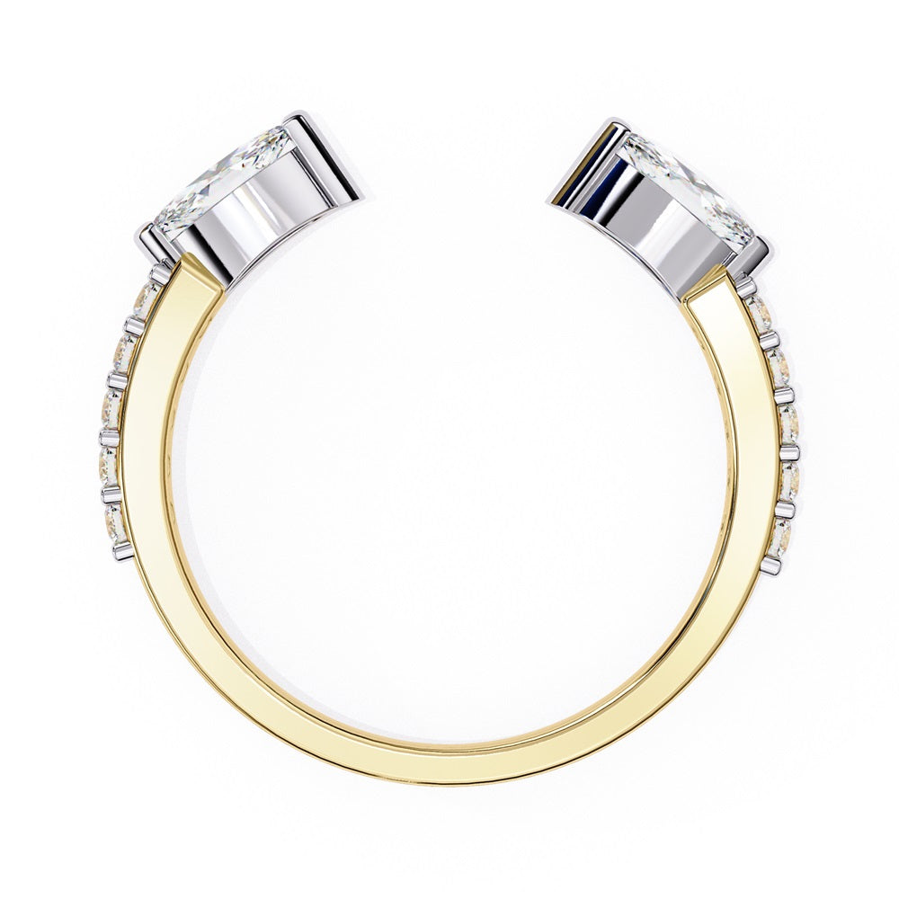 The Niraa Marquise Diamond Open Band is a luxury accessory with gold and silver featuring large marquise-cut diamonds at each end. Smaller rectangular diamonds sparkle on the sides, set against a plain white background.