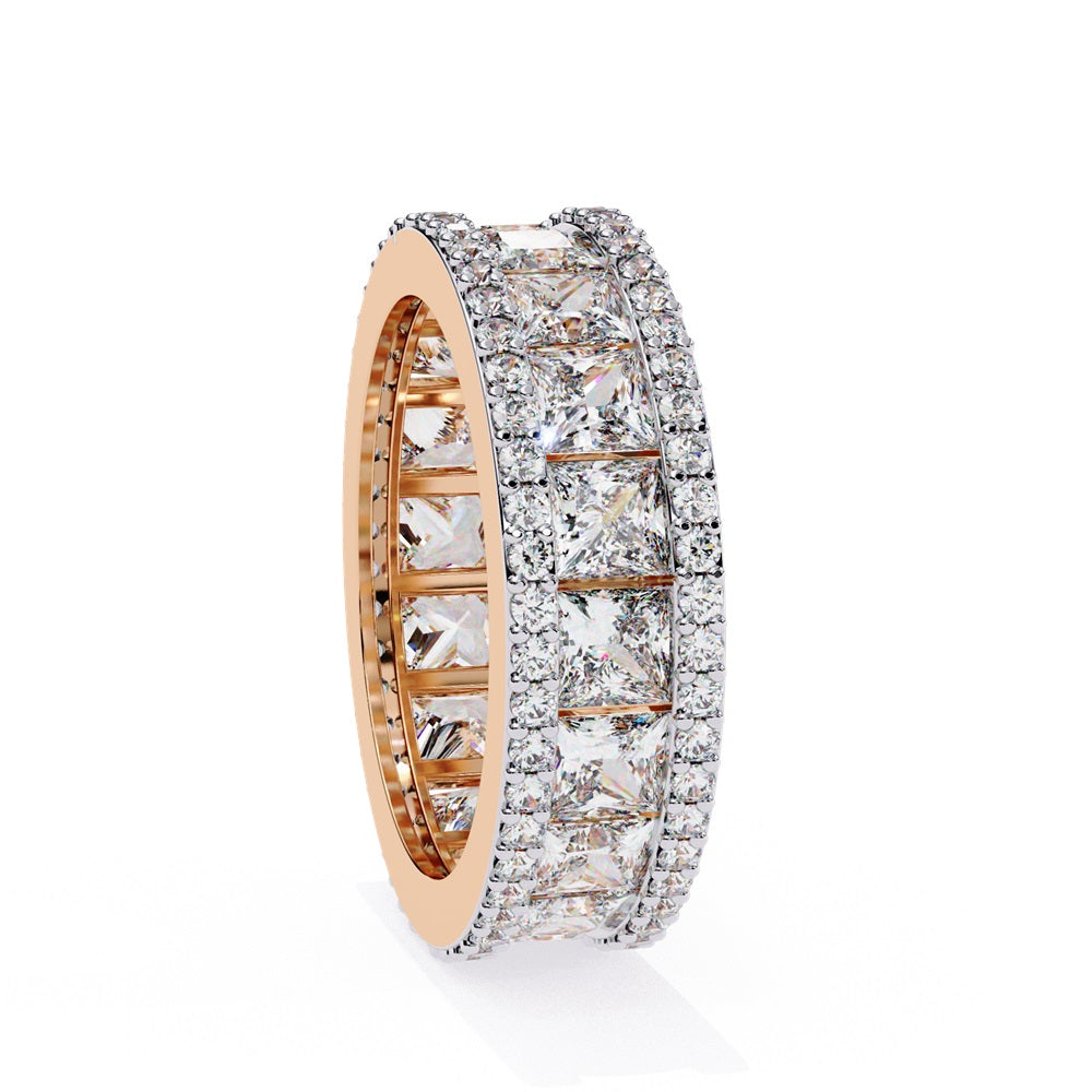 The Niraa Princess Cut Diamond Eternity Band showcases a princess-cut diamond centerpiece, framed by rows of smaller round diamonds.