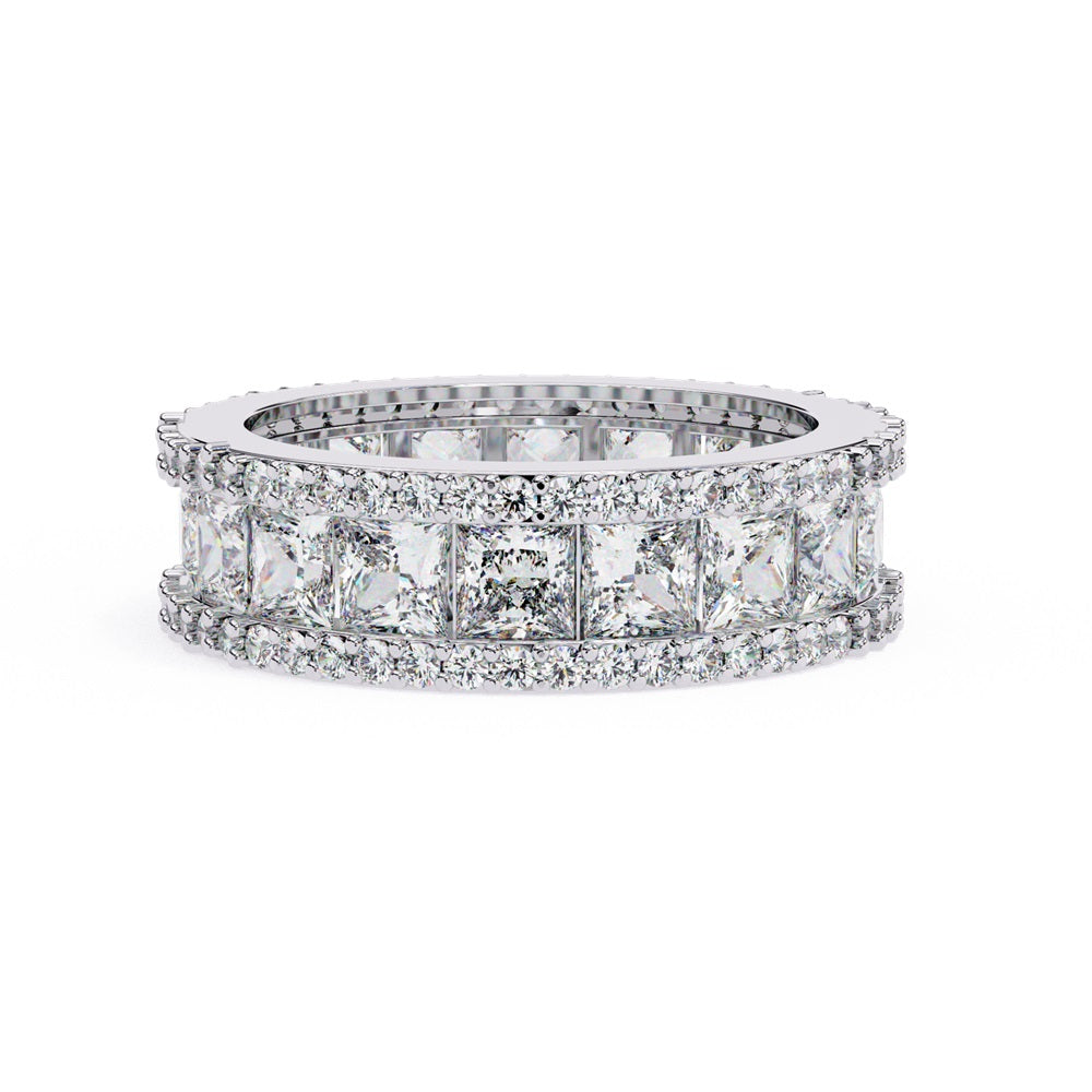 The Niraa Princess Cut Diamond Eternity Band showcases a princess-cut diamond centerpiece, framed by rows of smaller round diamonds.