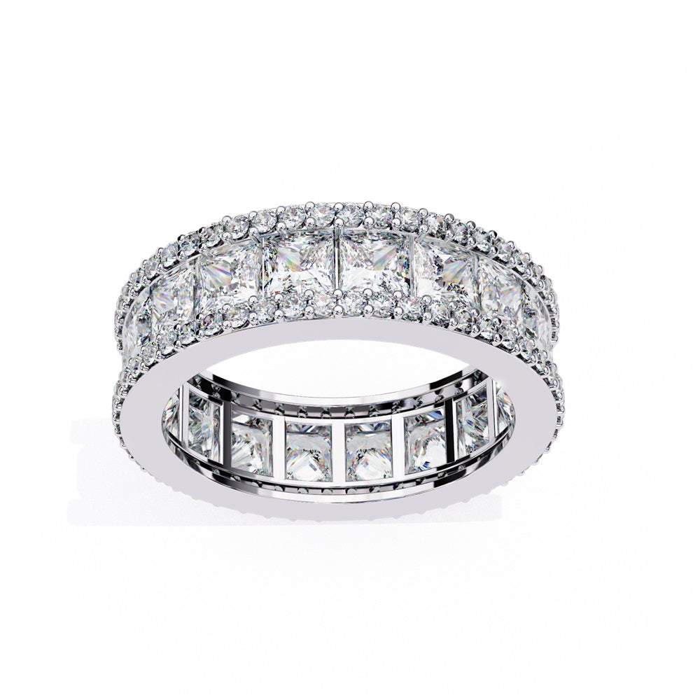 The Niraa Princess Cut Diamond Eternity Band showcases a princess-cut diamond centerpiece, framed by rows of smaller round diamonds.