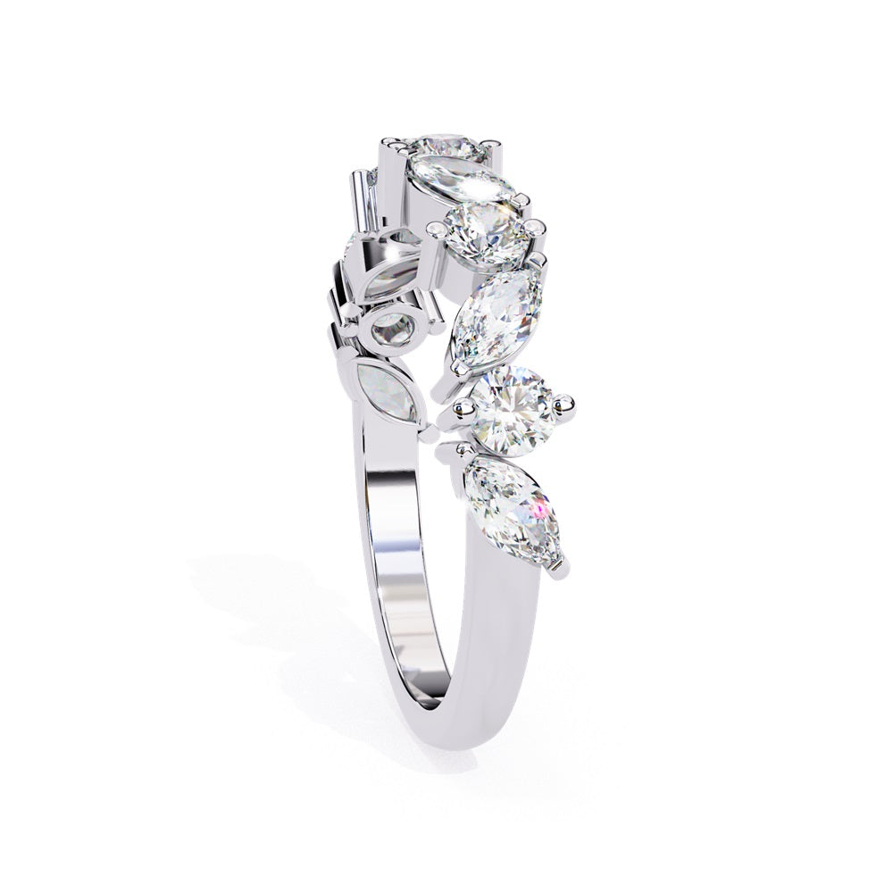 The Symphony Diamond Band by Niraa is a luxurious gold and silver ring with a central round diamond, flanked by marquise-cut diamonds for an elegant, symmetrical design.