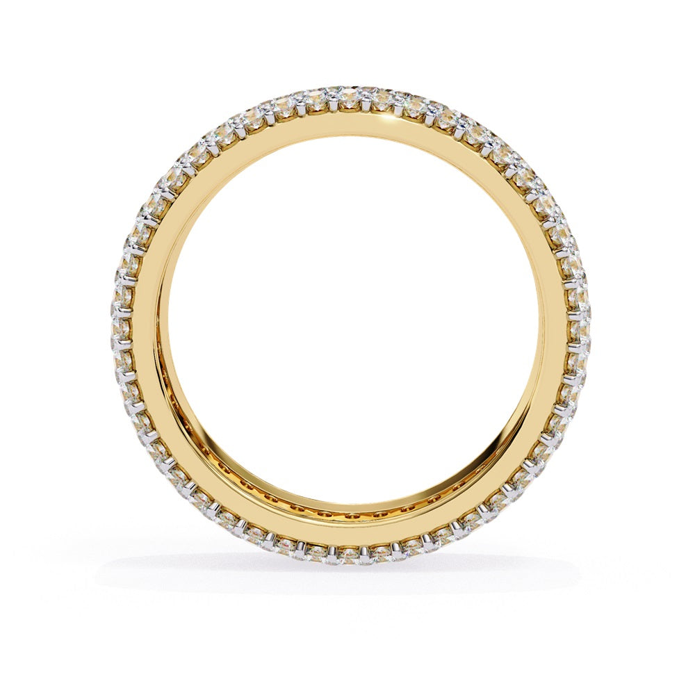 The Niraa Glimmering Diamond Eternity Band boasts five luxurious rows of closely set, round-cut white diamonds against a white background, highlighting its elegant craftsmanship and sparkle.