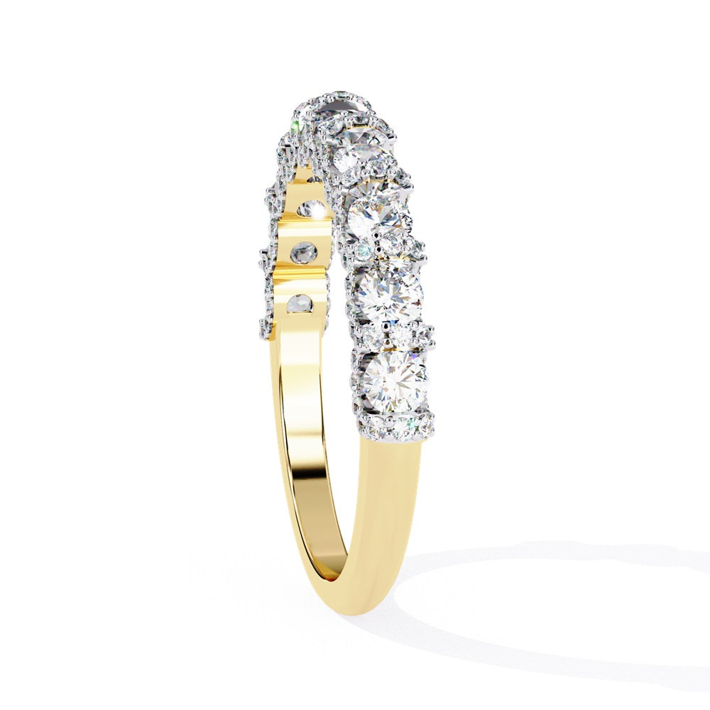 Discover the allure of Niraas Garland Diamond Band, a luxurious gold ring adorned with large, round, sparkling diamonds elegantly covering two-thirds of its surface, beautifully revealing the gleaming gold beneath.