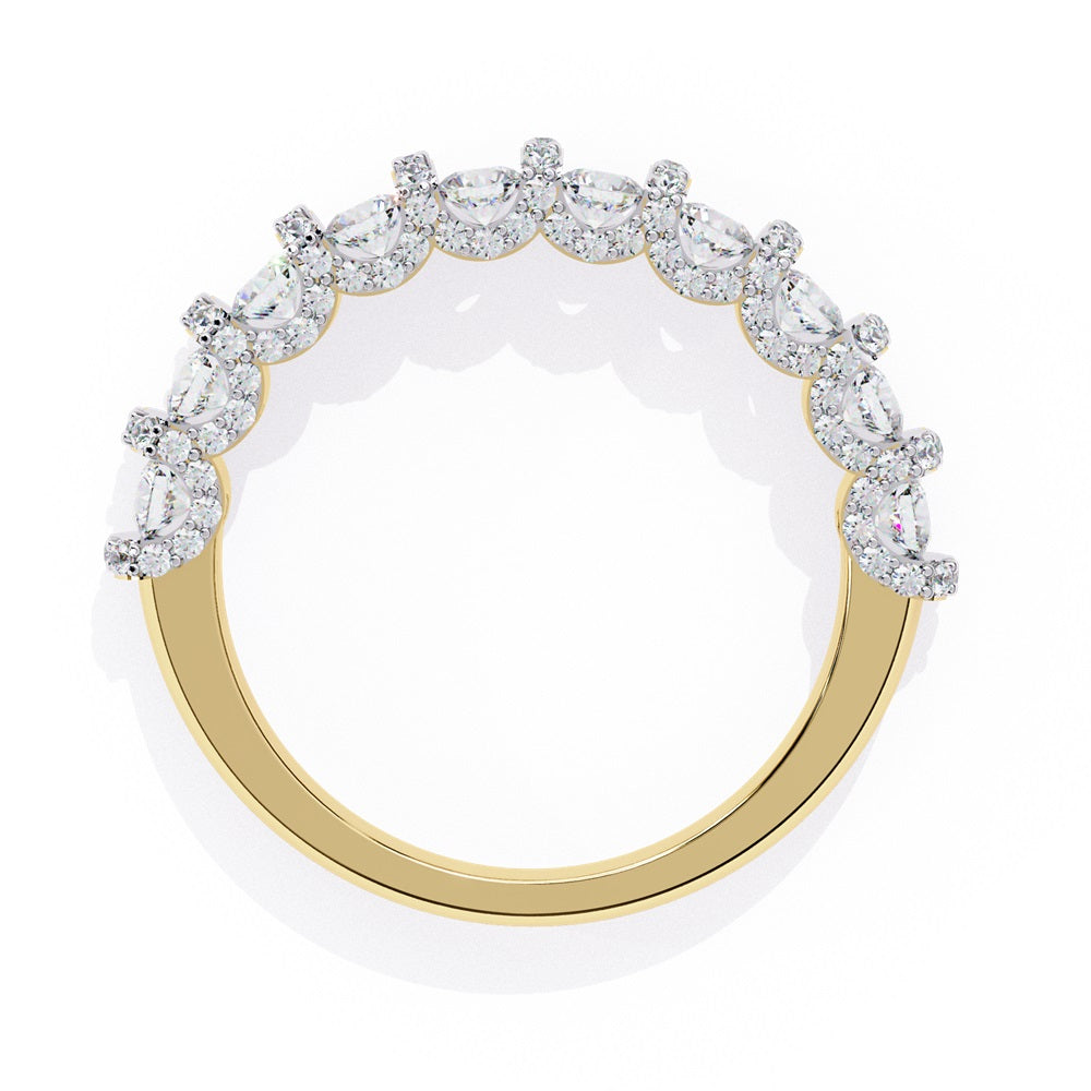 Discover the allure of Niraas Garland Diamond Band, a luxurious gold ring adorned with large, round, sparkling diamonds elegantly covering two-thirds of its surface, beautifully revealing the gleaming gold beneath.