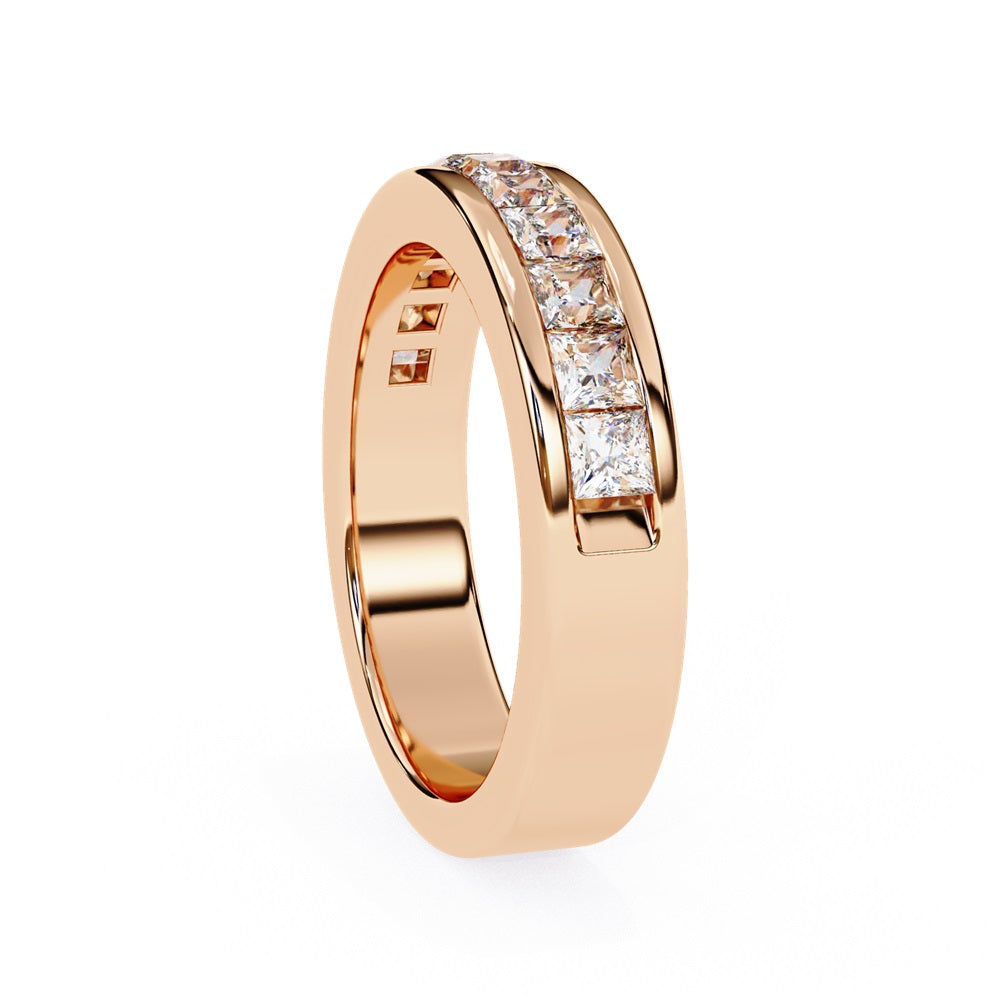 The Niraa Princess Channel Diamond Band is a stunning gold piece featuring square-cut, clear gemstones in a channel setting, elegantly viewed from the side against a plain white background.