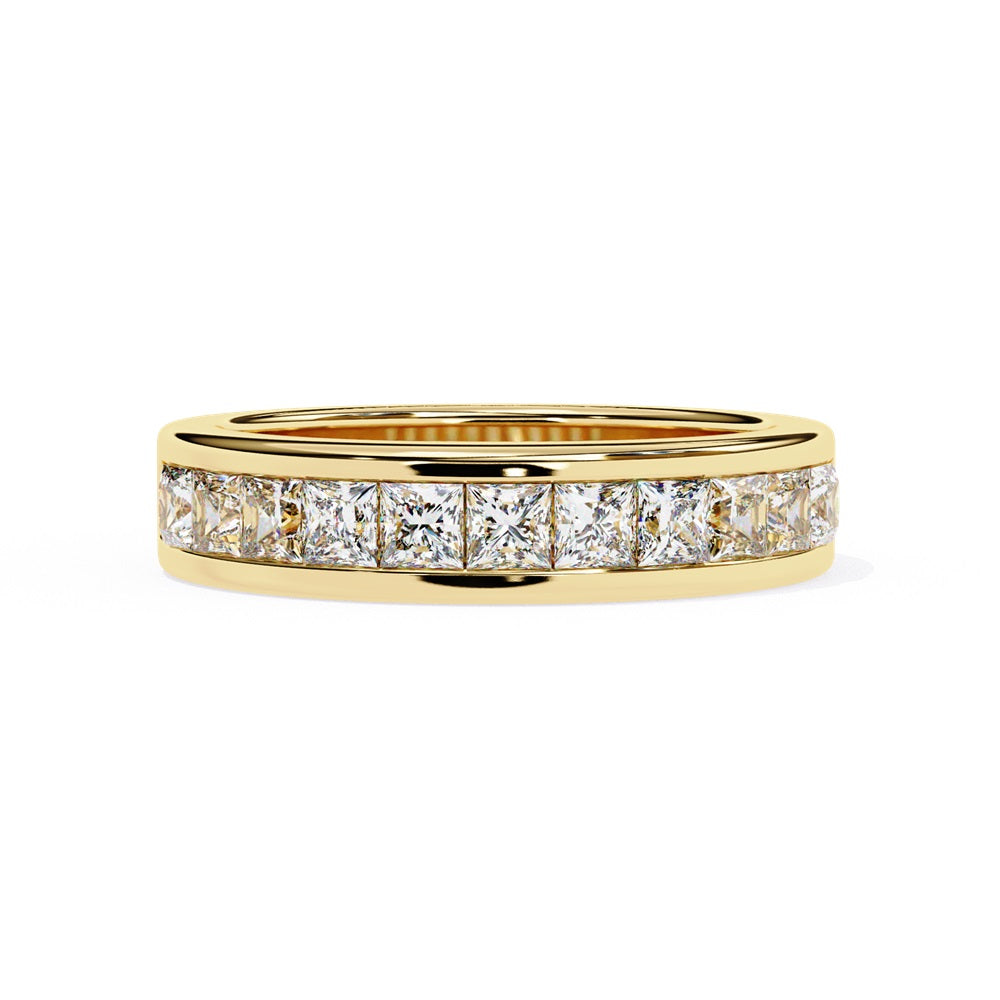 The Niraa Princess Channel Diamond Band is a stunning gold piece featuring square-cut, clear gemstones in a channel setting, elegantly viewed from the side against a plain white background.