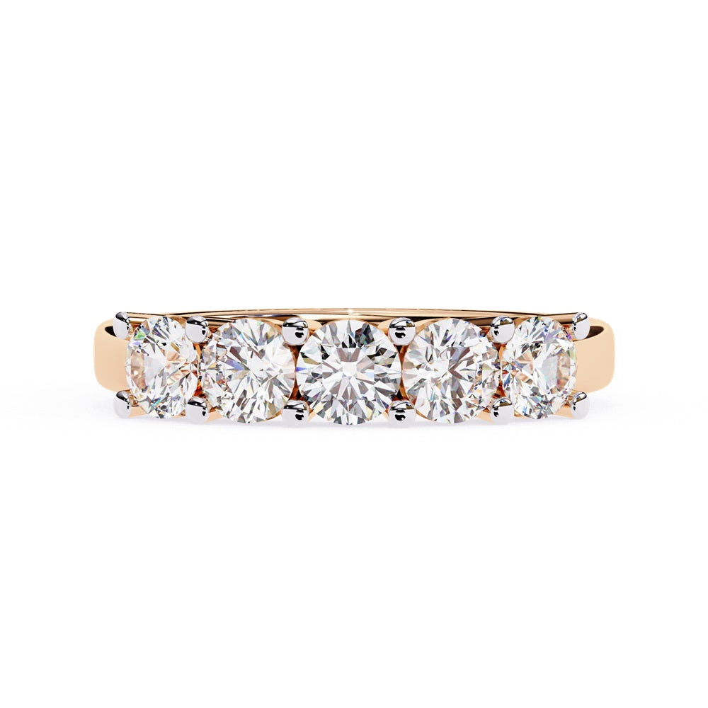 Niraas Five Stone Diamond Band is a stunning gold ring with five round brilliant-cut diamonds in an elegant prong setting. Each stone comes with a diamond certificate, highlighting their clarity and sparkle against the sleek gold band.