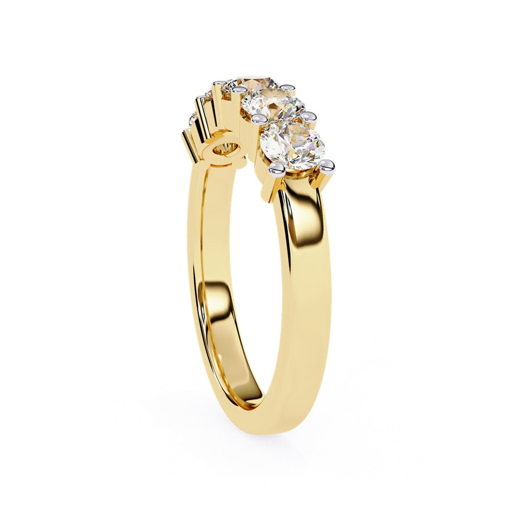Niraas Five Stone Diamond Band is a stunning gold ring with five round brilliant-cut diamonds in an elegant prong setting. Each stone comes with a diamond certificate, highlighting their clarity and sparkle against the sleek gold band.