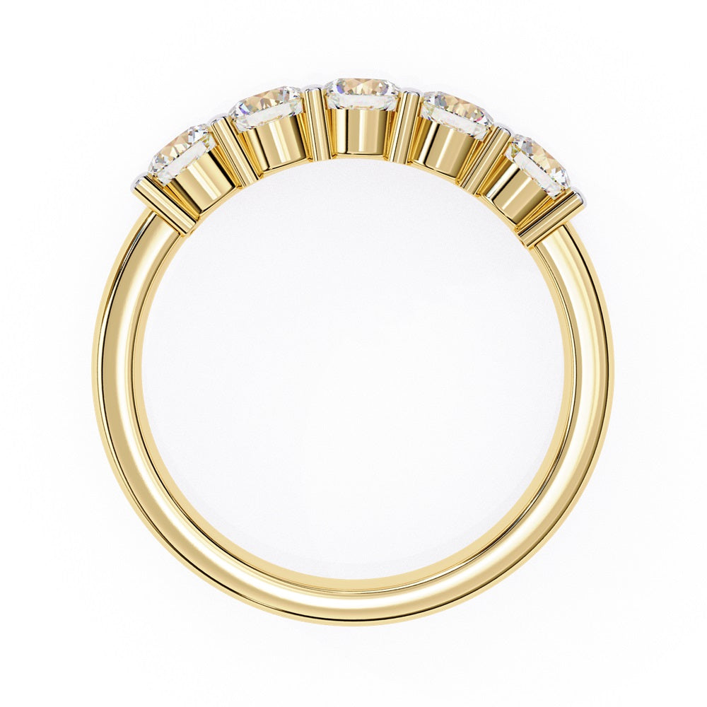 Niraas Five Stone Diamond Band is a stunning gold ring with five round brilliant-cut diamonds in an elegant prong setting. Each stone comes with a diamond certificate, highlighting their clarity and sparkle against the sleek gold band.