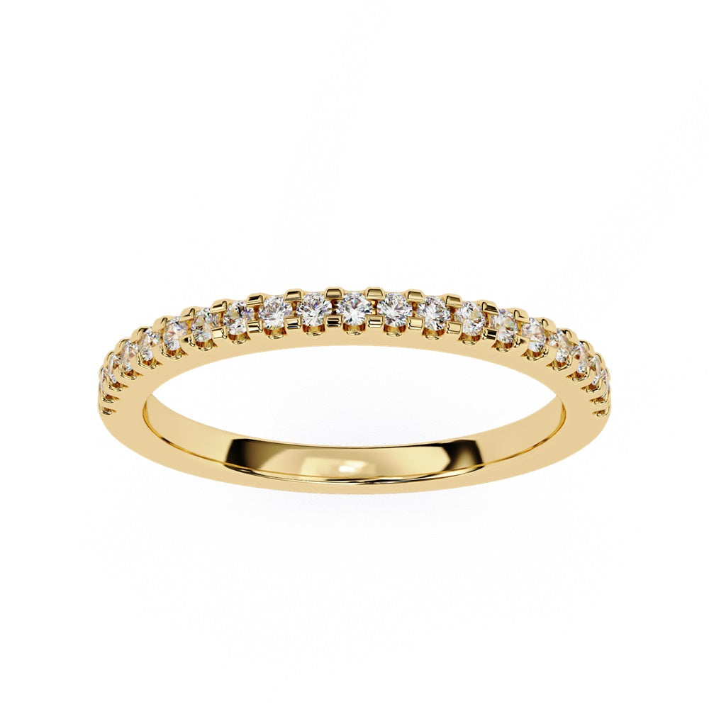 The Niraa Hope Diamond Band is a luxurious gold ring featuring a single row of small, sparkling diamonds. Its polished finish enhances the brilliance, making it truly exquisite.