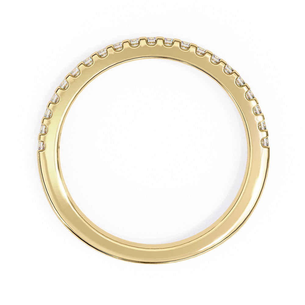 The Niraa Hope Diamond Band is a luxurious gold ring featuring a single row of small, sparkling diamonds. Its polished finish enhances the brilliance, making it truly exquisite.