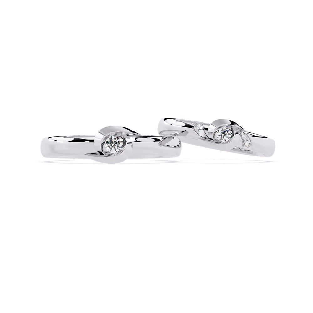 Two stunning rose gold wedding bands, each set with diamonds, embodying the love shared by a couple.