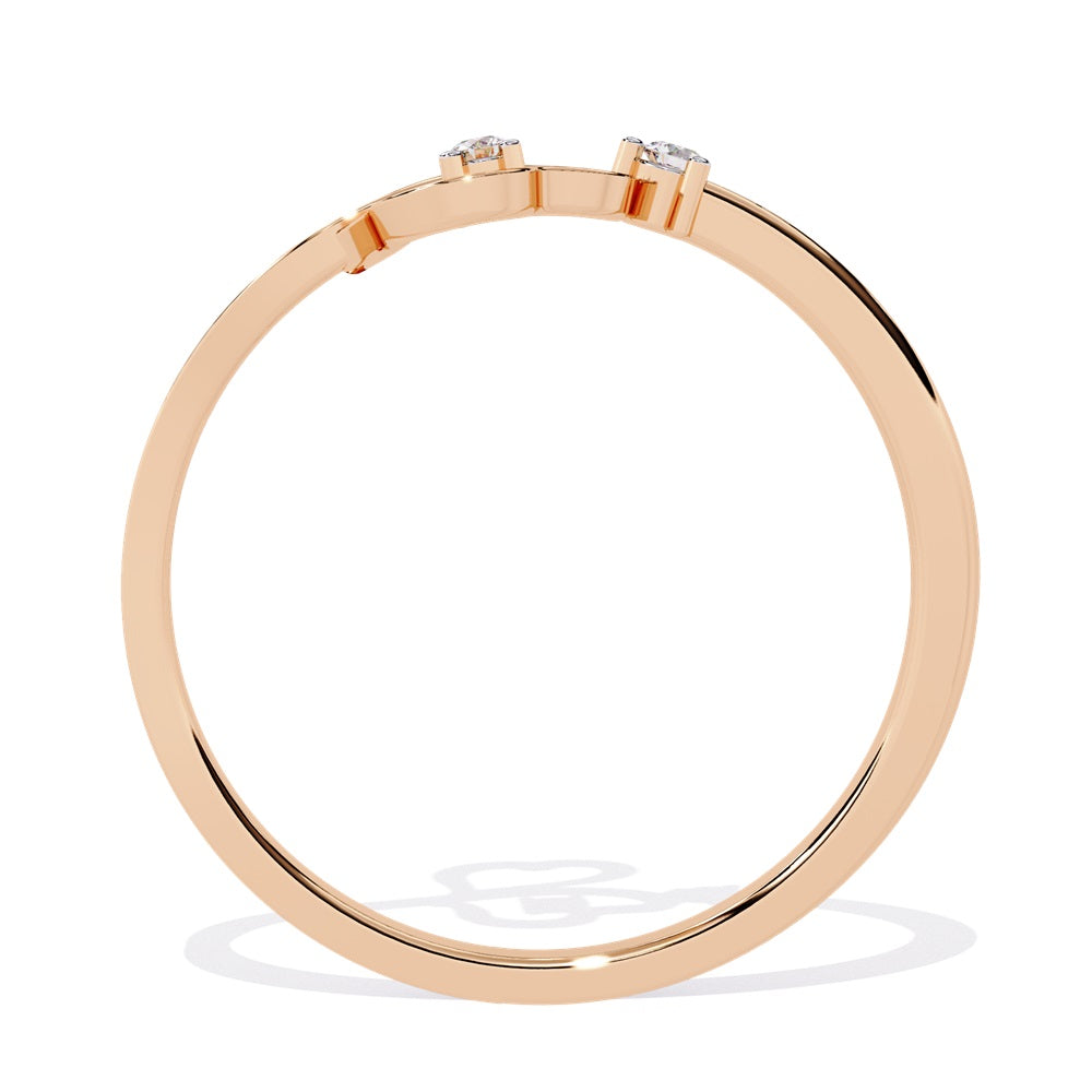 Elegant gold and diamond ring adorned with two heart shapes, representing affection and unity in a timeless piece of jewelry.