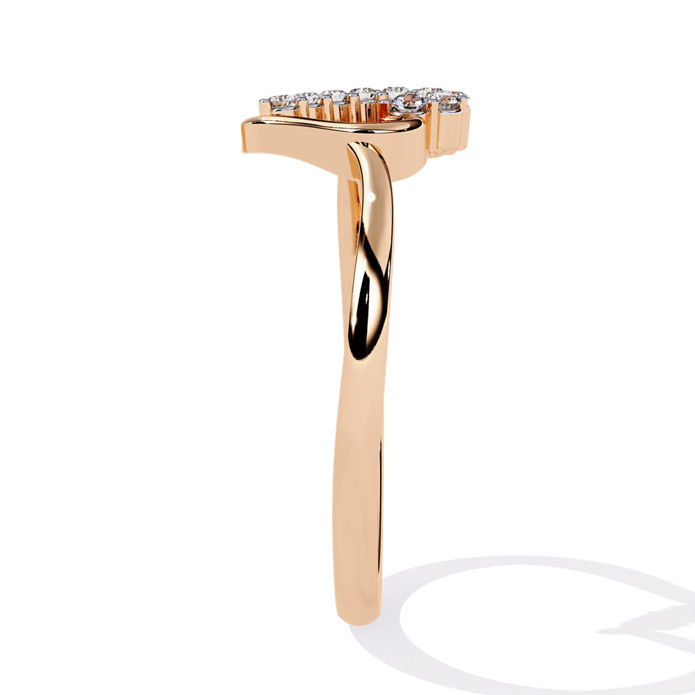 An exquisite gold ring in the shape of a heart, featuring dazzling diamonds that enhance its romantic charm.