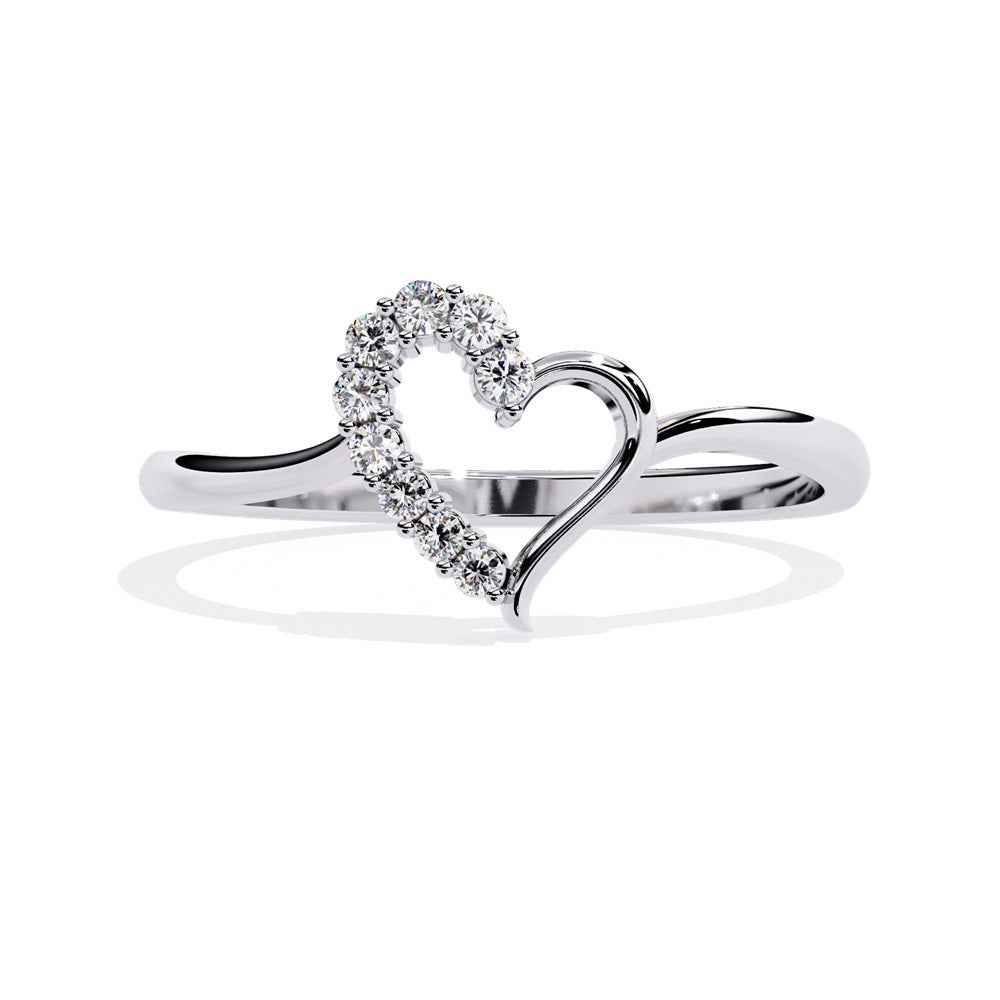 An exquisite gold ring in the shape of a heart, featuring dazzling diamonds that enhance its romantic charm.