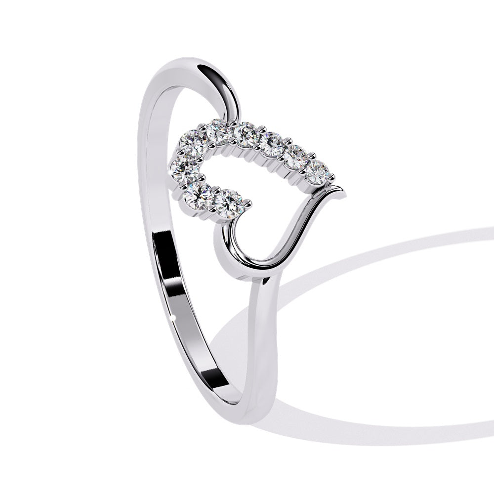An exquisite gold ring in the shape of a heart, featuring dazzling diamonds that enhance its romantic charm.