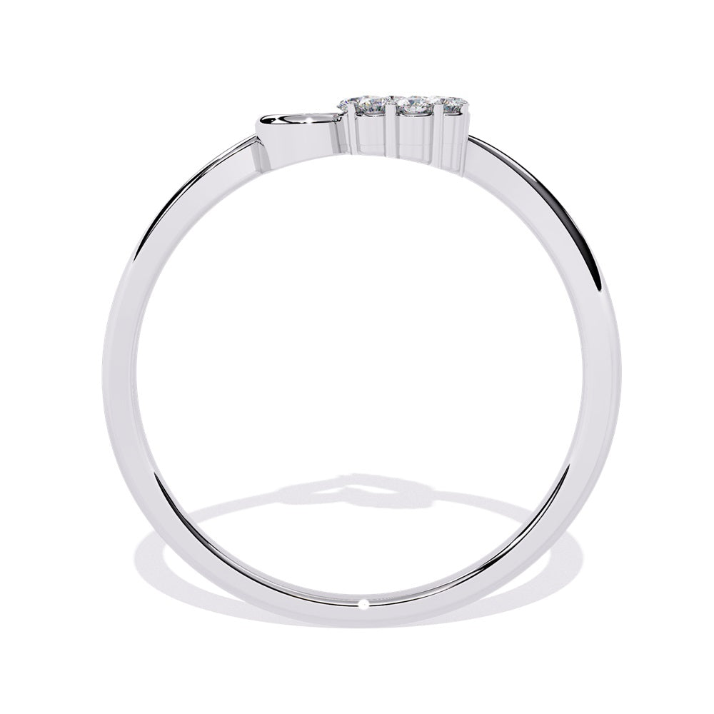 An exquisite gold ring in the shape of a heart, featuring dazzling diamonds that enhance its romantic charm.