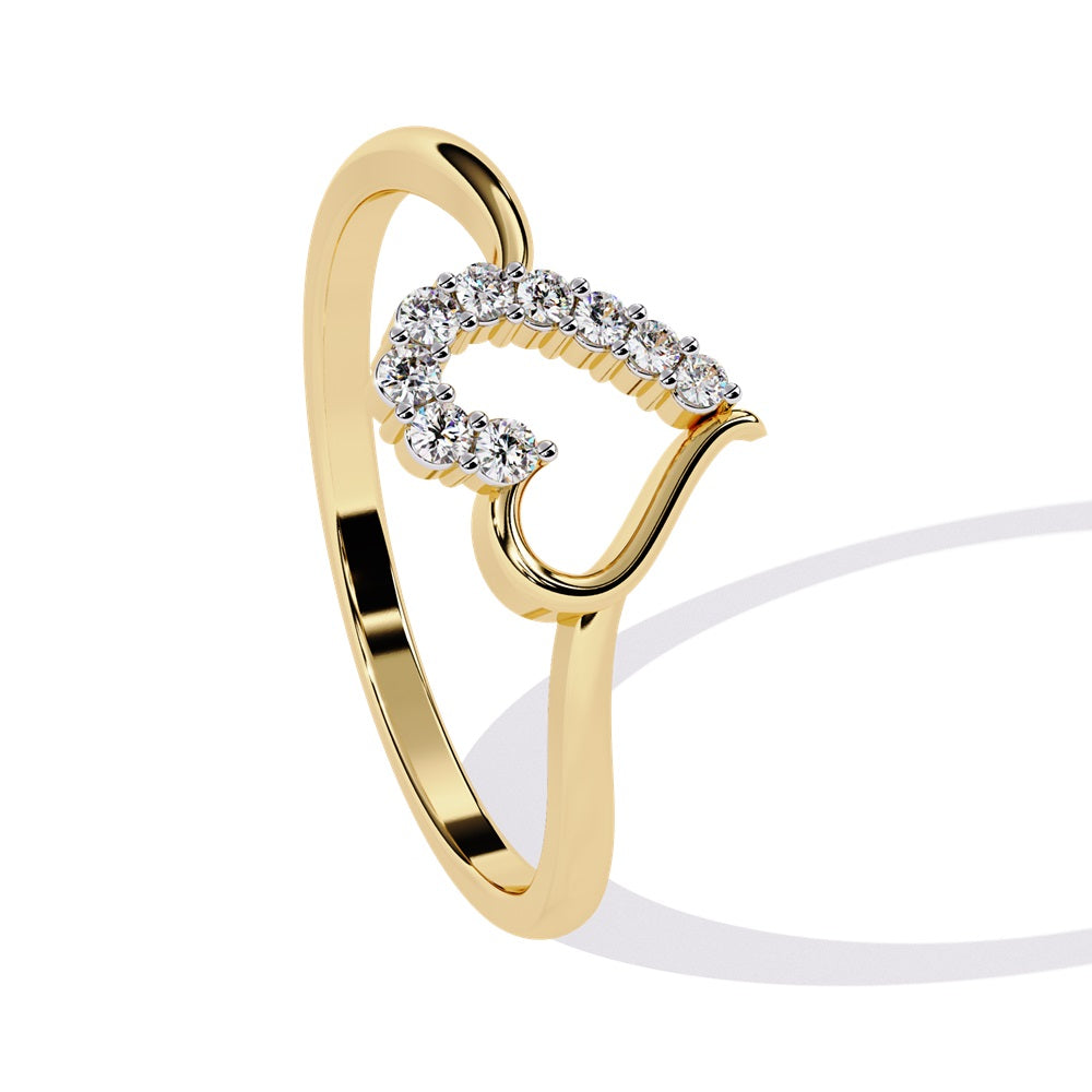 An exquisite gold ring in the shape of a heart, featuring dazzling diamonds that enhance its romantic charm.