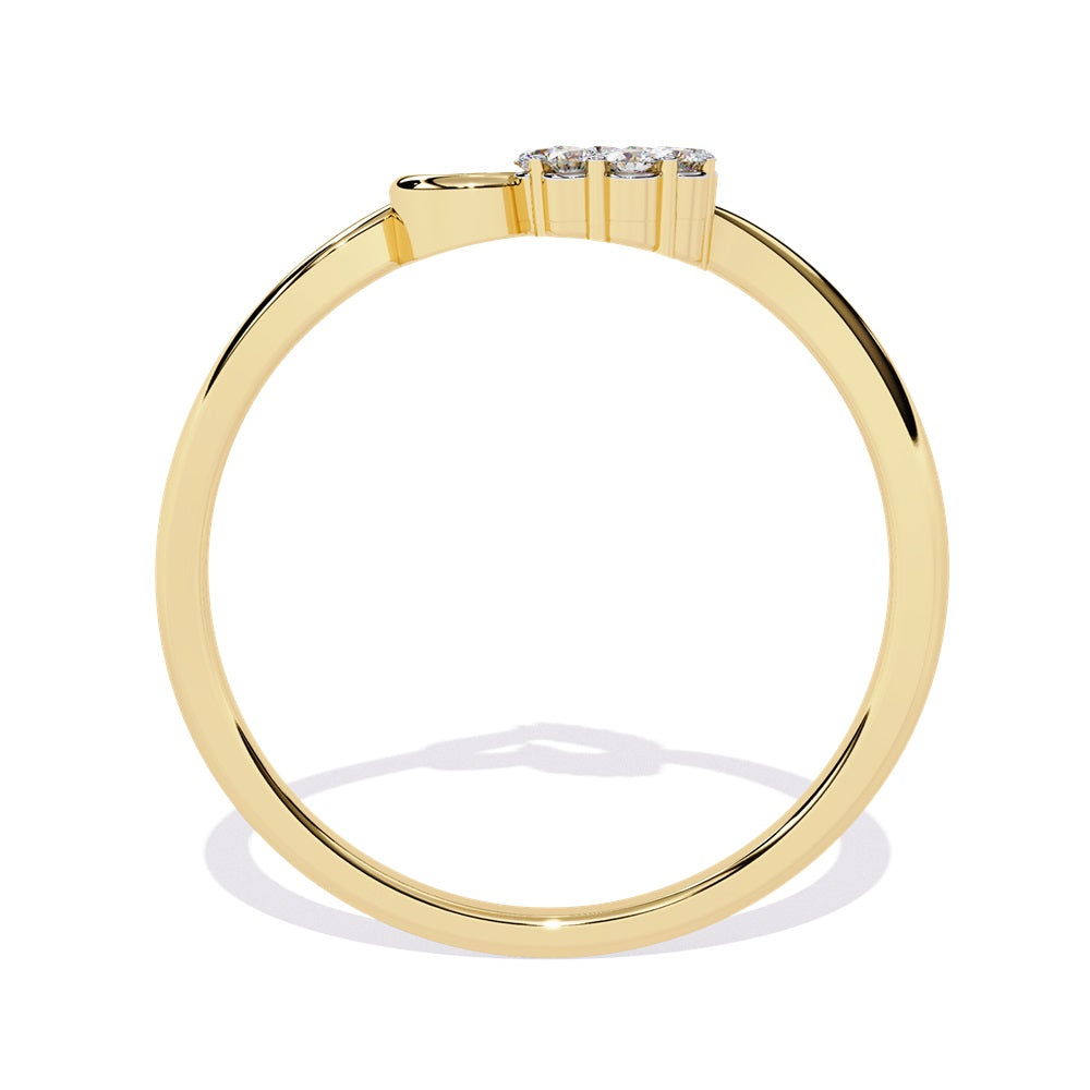 An exquisite gold ring in the shape of a heart, featuring dazzling diamonds that enhance its romantic charm.