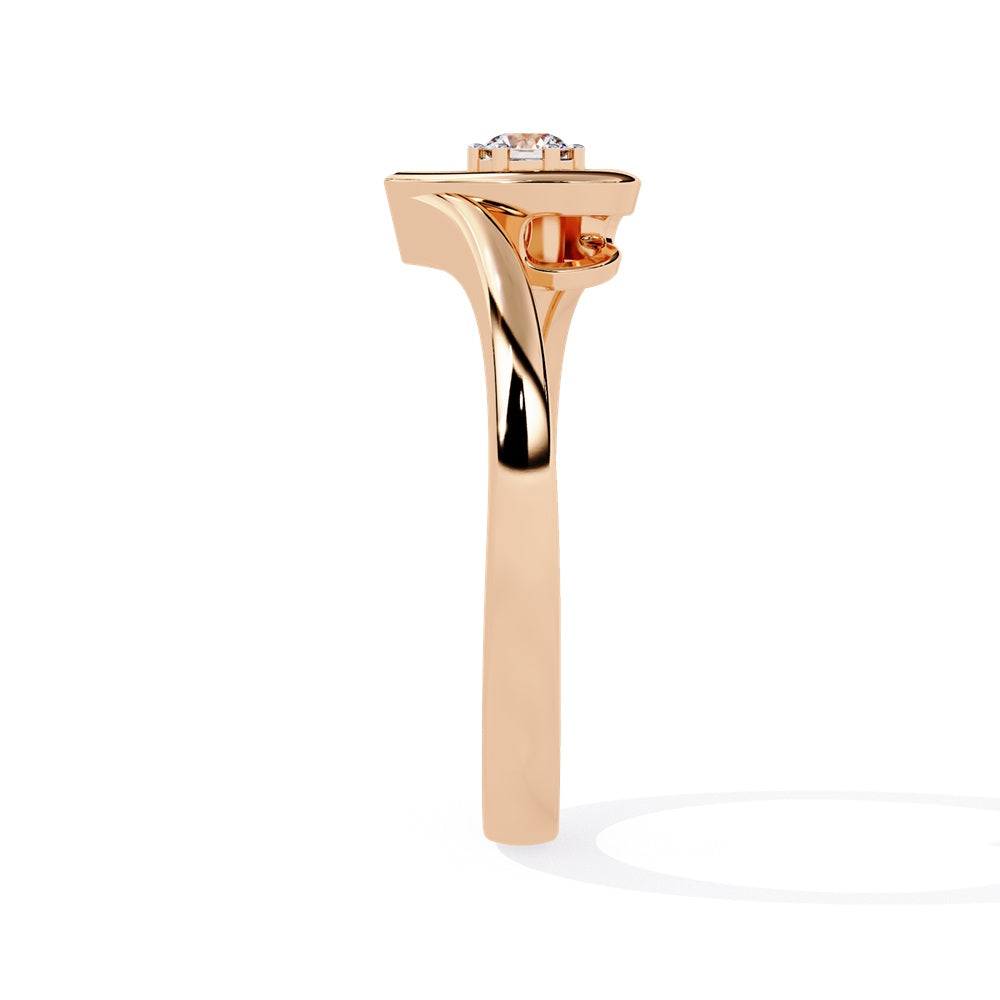 A gold diamond heart ring, elegantly designed, showcasing a sparkling diamond at its center, symbolizing love and affection.