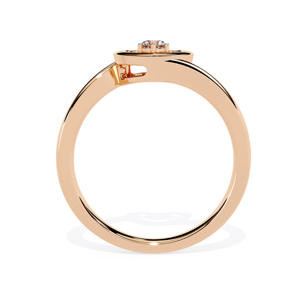 A gold diamond heart ring, elegantly designed, showcasing a sparkling diamond at its center, symbolizing love and affection.