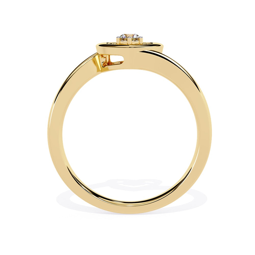 A gold diamond heart ring, elegantly designed, showcasing a sparkling diamond at its center, symbolizing love and affection.