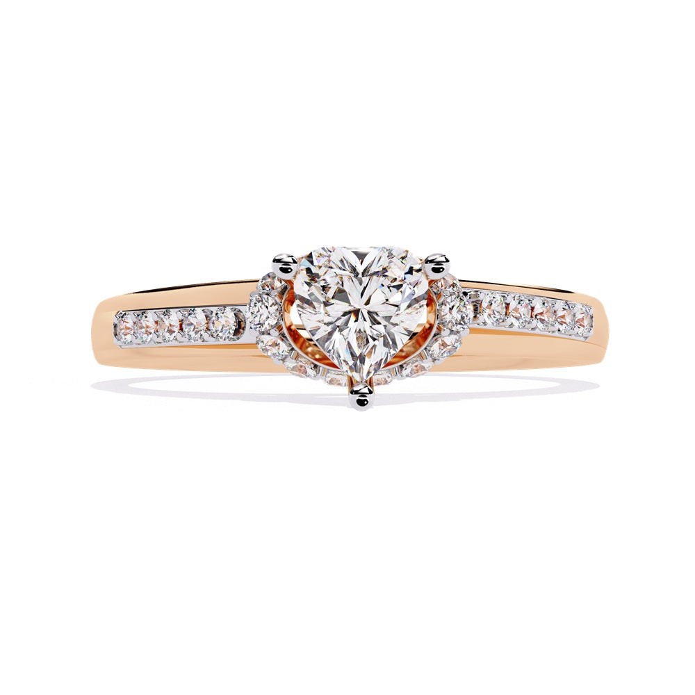A gold solitaire engagement ring featuring a heart-shaped diamond surrounded by a delicate halo of smaller stones.