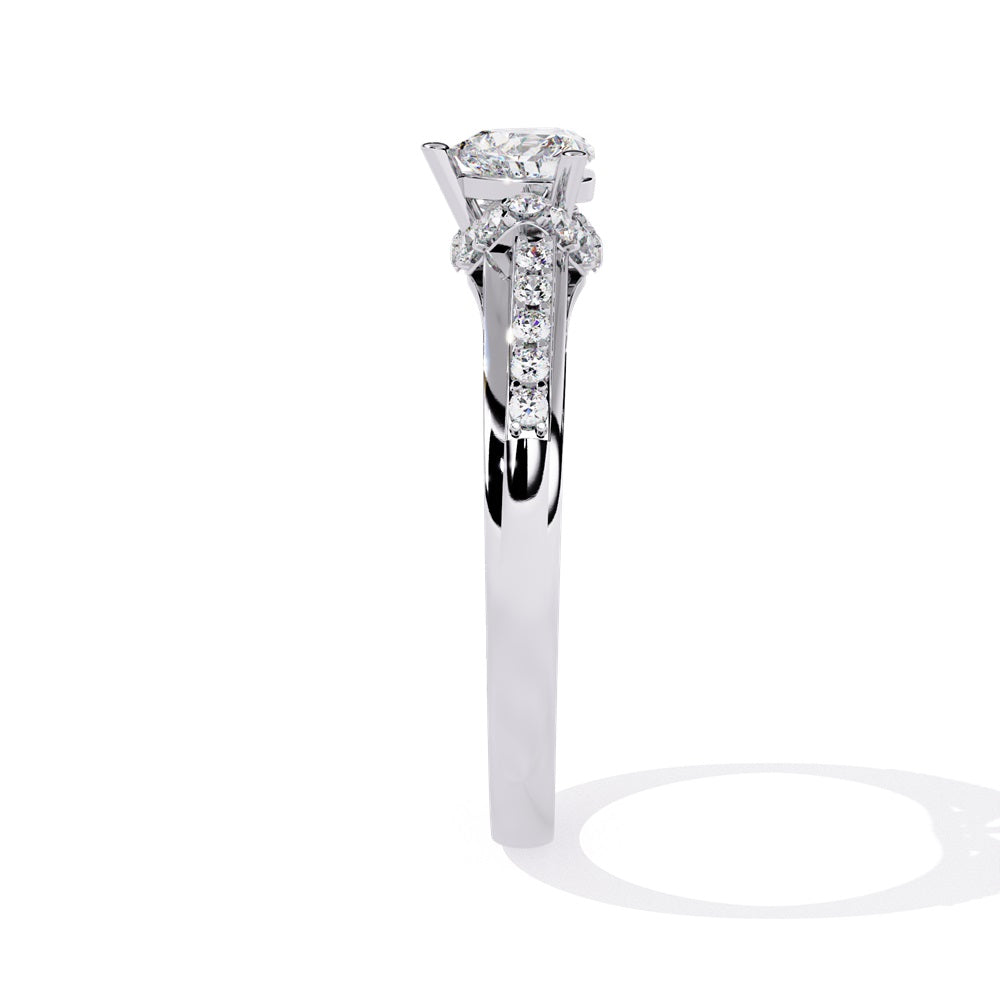 A gold solitaire engagement ring featuring a heart-shaped diamond surrounded by a delicate halo of smaller stones.