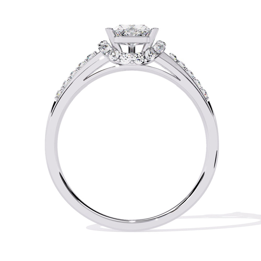 A gold solitaire engagement ring featuring a heart-shaped diamond surrounded by a delicate halo of smaller stones.