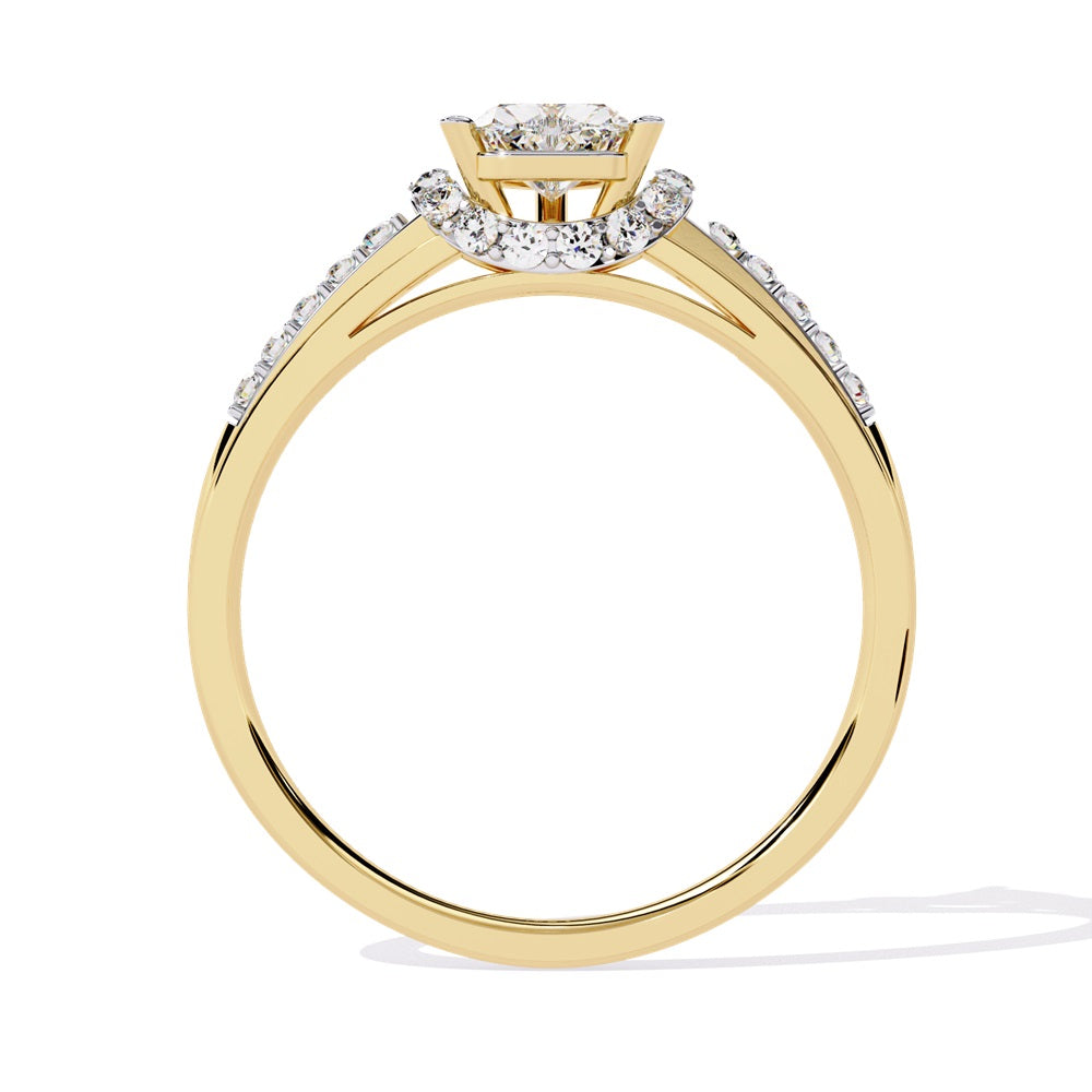 A gold solitaire engagement ring featuring a heart-shaped diamond surrounded by a delicate halo of smaller stones.