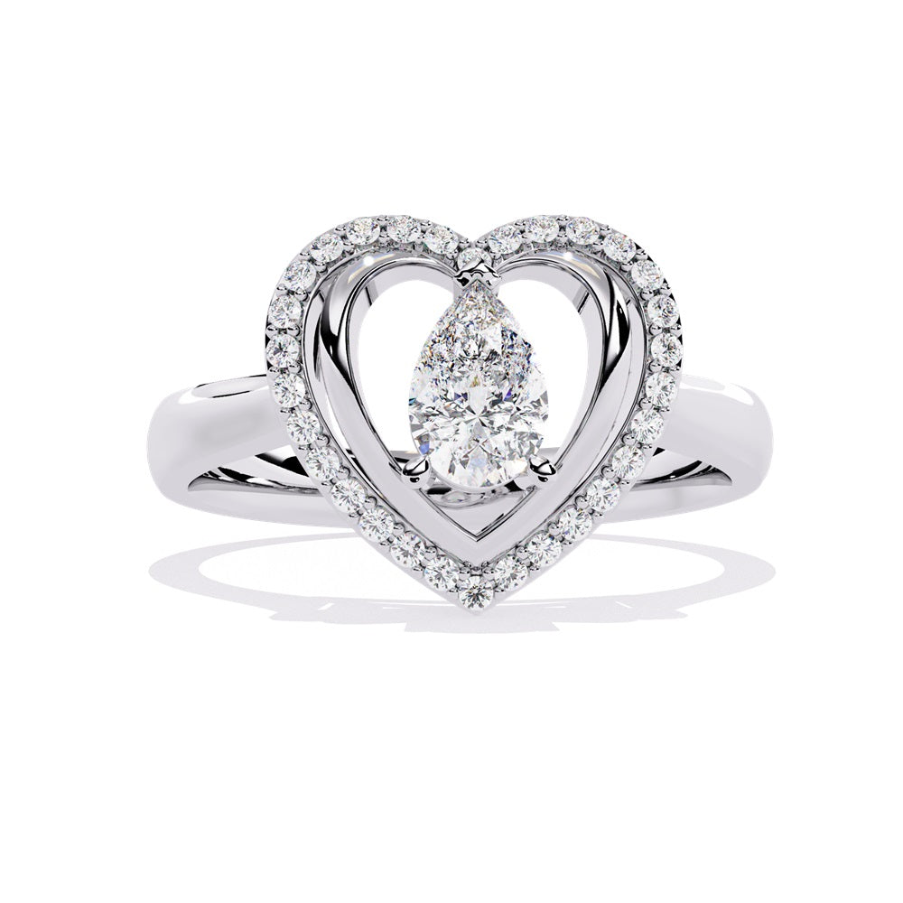 A pear-shaped diamond ring in gold, encircled by smaller diamonds, forming a heart shape around the centerpiece.