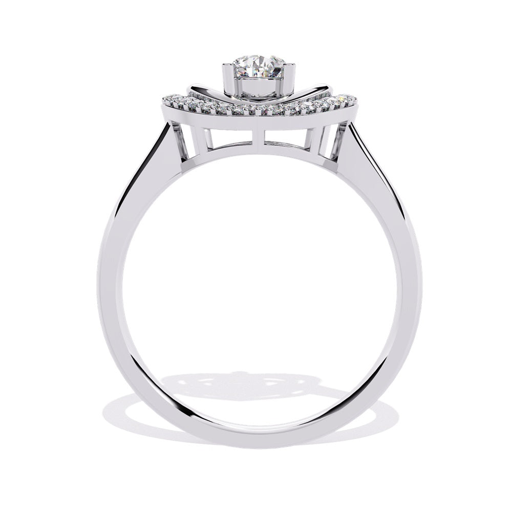 A pear-shaped diamond ring in gold, encircled by smaller diamonds, forming a heart shape around the centerpiece.