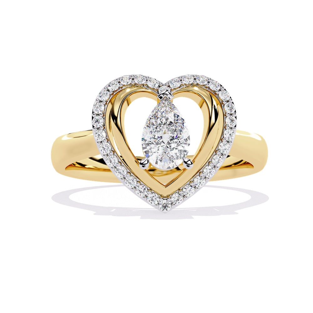 A pear-shaped diamond ring in gold, encircled by smaller diamonds, forming a heart shape around the centerpiece.