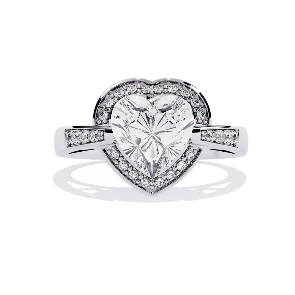 A heart-shaped diamond ring in gold, featuring a solitaire design with a halo of smaller diamonds surrounding it.