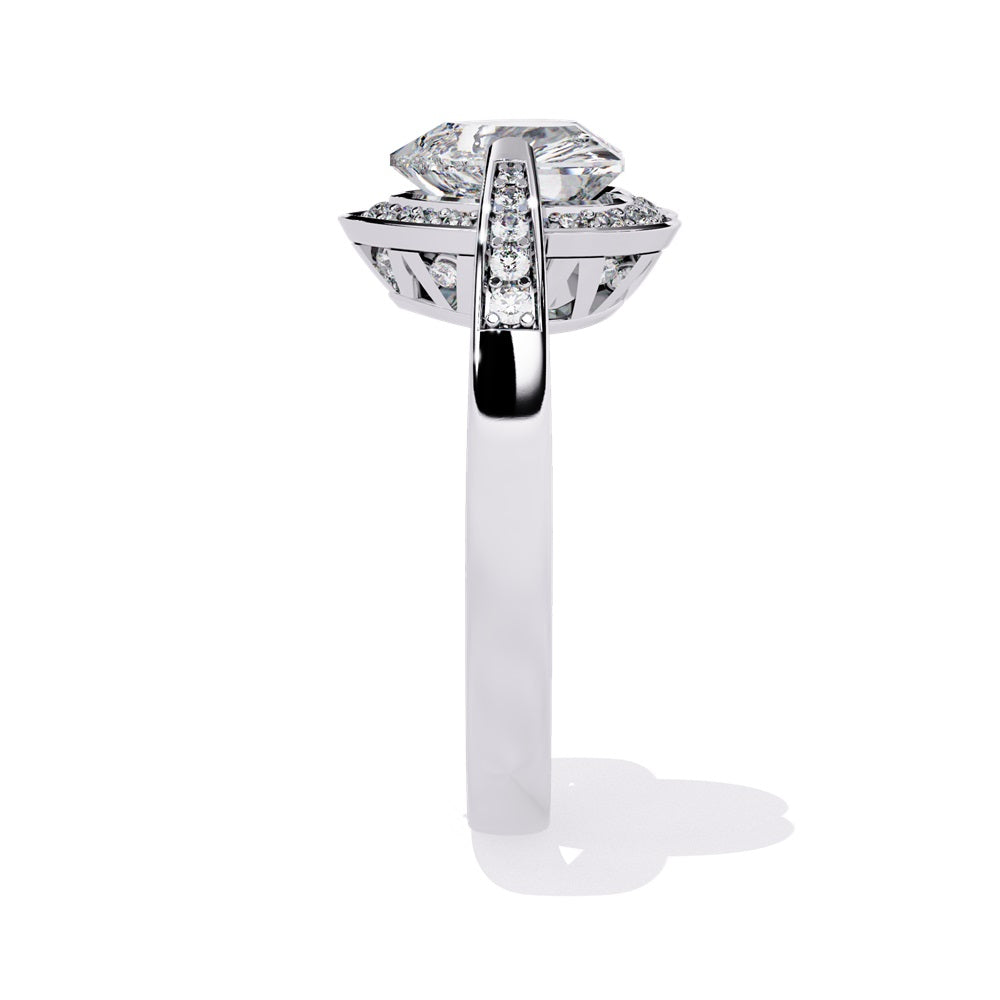 A heart-shaped diamond ring in gold, featuring a solitaire design with a halo of smaller diamonds surrounding it.