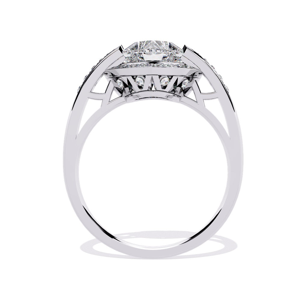 A heart-shaped diamond ring in gold, featuring a solitaire design with a halo of smaller diamonds surrounding it.