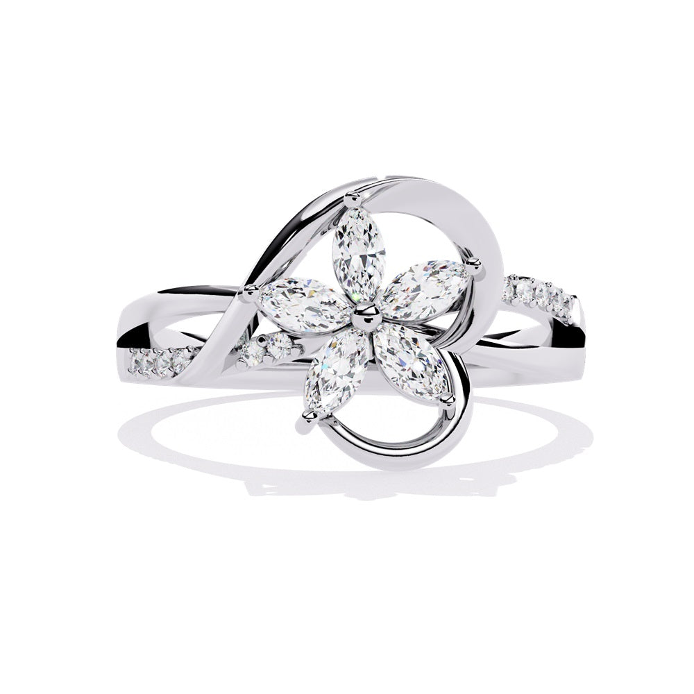Elegant gold ring adorned with a diamond flower, symbolizing beauty and luxury in exquisite craftsmanship.