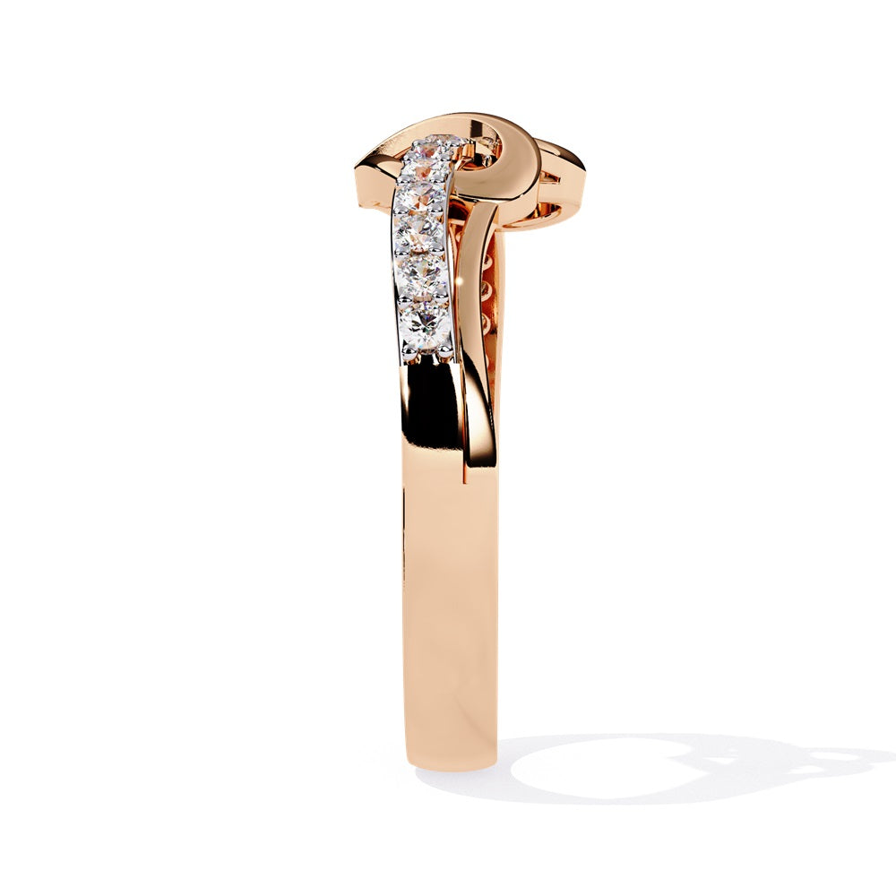 An exquisite diamond studded gold band  featuring a heart in the centre reflecting a romantic touch.