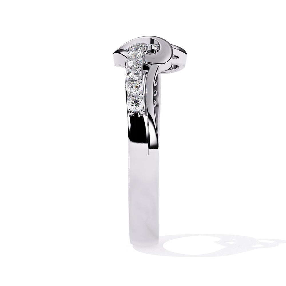An exquisite diamond studded gold band  featuring a heart in the centre reflecting a romantic touch.