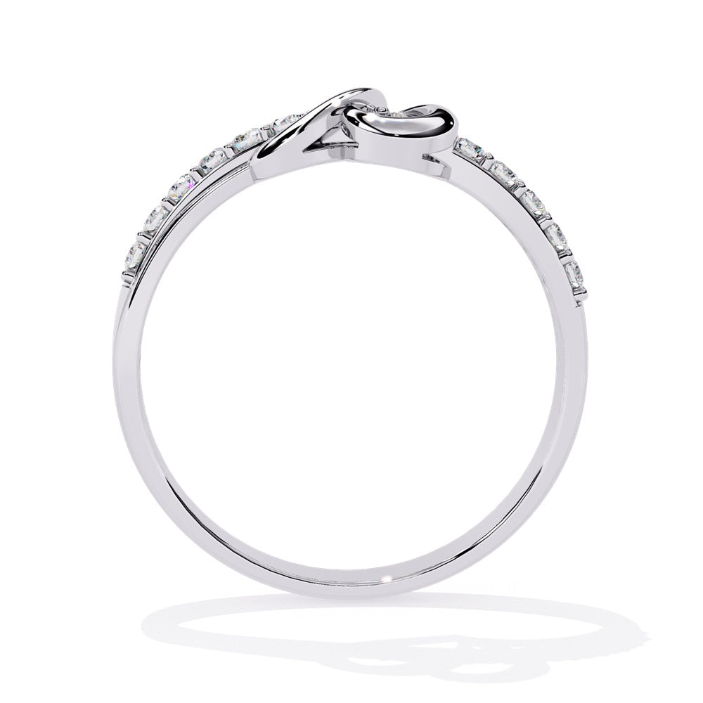 An exquisite diamond studded gold band  featuring a heart in the centre reflecting a romantic touch.