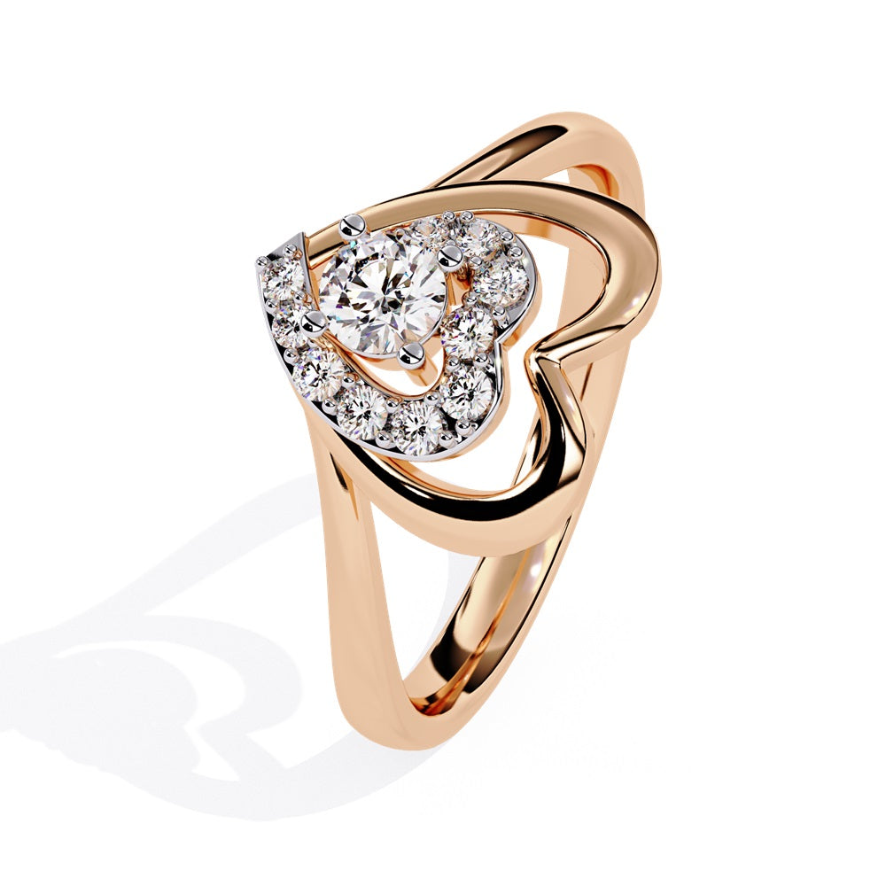A beautifully crafted gold ring in the shape of a heart, embellished with a radiant diamond studded heart and center stone, representing love.