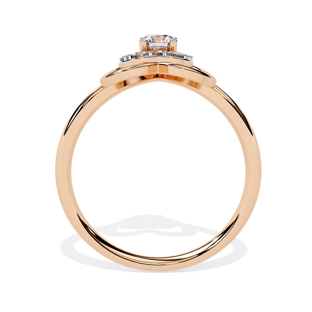 A beautifully crafted gold ring in the shape of a heart, embellished with a radiant diamond studded heart and center stone, representing love.
