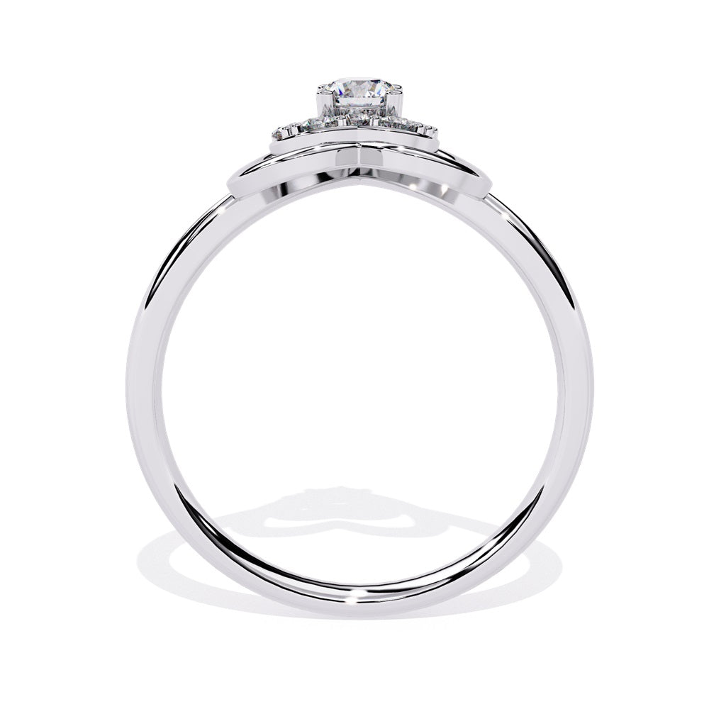 A beautifully crafted gold ring in the shape of a heart, embellished with a radiant diamond studded heart and center stone, representing love.