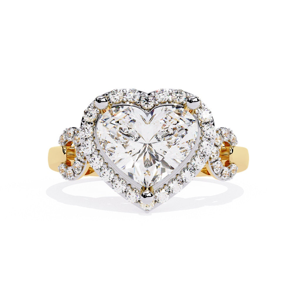 A heart-shaped diamond ring in gold, featuring a solitaire design with a halo of smaller diamonds surrounding it.
