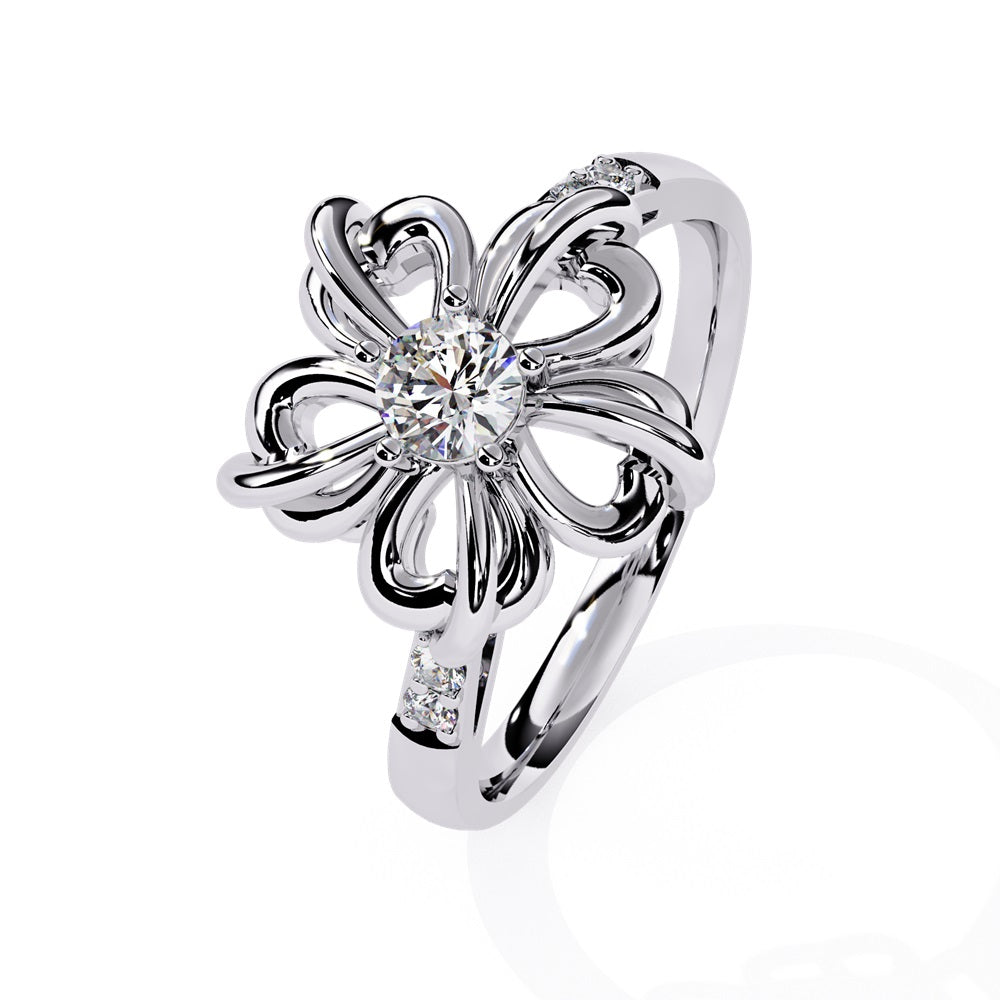 A beautiful flower-shaped ring in gold, accented with diamonds, symbolizing grace and timeless style.