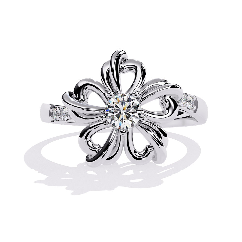 A beautiful flower-shaped ring in gold, accented with diamonds, symbolizing grace and timeless style.